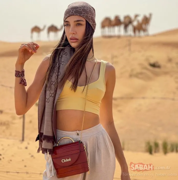 Fit anne Özlem Ada Şahin’in çöl pozları sosyal medyayı salladı! Şarkıcı Berkay ile Özlem Ada Şahin bu kez Dubai’de...