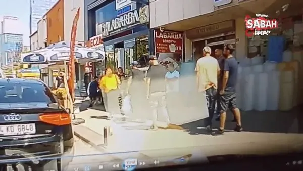 Genç kadın tartıştığı eşi tarafından sokak ortasında böyle yumruklandı | Video