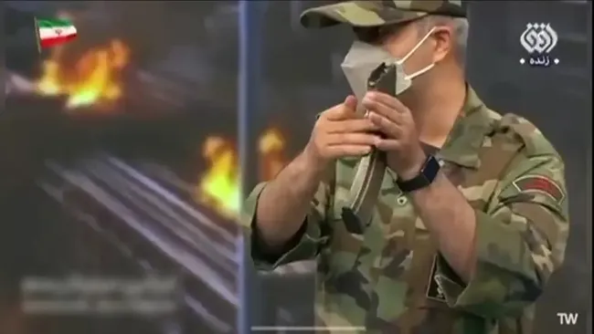 iran-devlet-televizyonunda-carpici-goruntuler-silah-kullanimini-anlattilar-1778958168527.jpeg