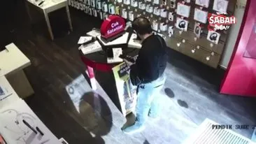Pendik’te müşteri kılığında girdiği iş yerinden 15 bin TL değerinde telefon çaldı | Video