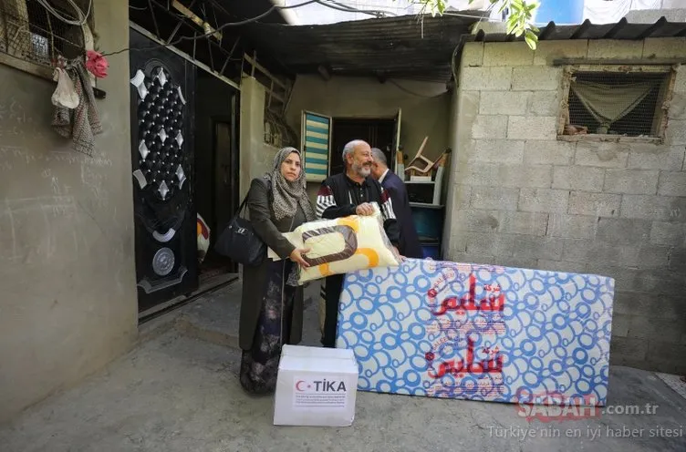 Türkiye yine yüzleri güldürdü! TİKA Filistinli 1100 aileye yardım paketi dağıttı