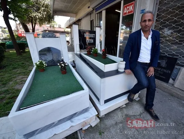 mezar tasinin uzerine telefon