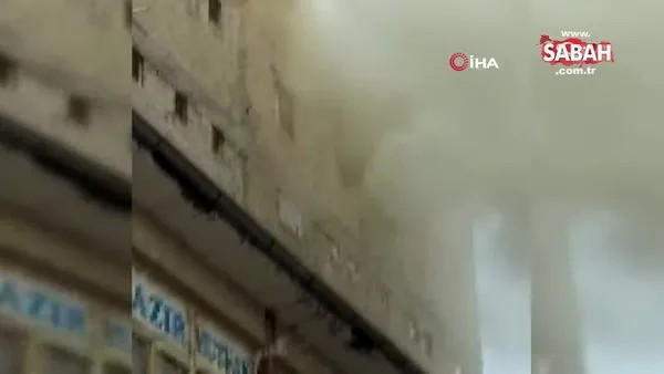 Van'da yangında mahsur kalan hamile kadının camdan atlama anı kamerada | Video