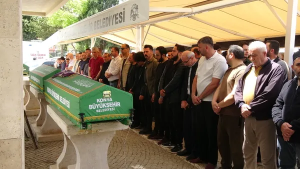 konyada-aile-faciasi-ogullari-tarafindan-katledilen-veteriner-cift-son-yolculuguna-ugurlandi-anne-babasini-def-1779022540761.jpg