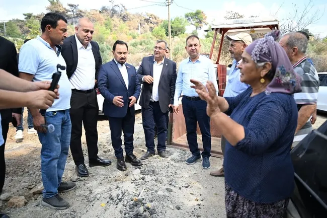 baskan-uludag-ve-mhp-heyetinden-adanadaki-yanginzedelere-destek-ziyareti-1789631313589.jpeg