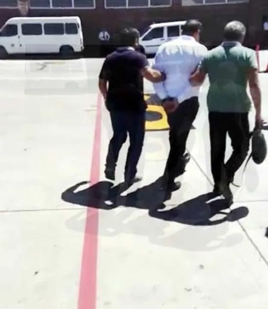 Taner Nakiboğlu gözaltına alınırken görüntülendi