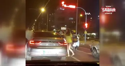 Trafikte sürücüleri şaşırtan kırmızı ışık dansı | Video