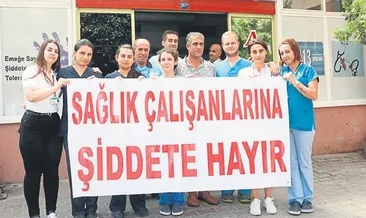 Sağlık çalışanından pankartla özür diledi