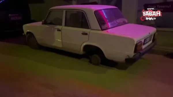 Bursa'da pes dedirten hırsızlık. Park halindeki aracın lastiğini söküp kendi aracına taktı | Video