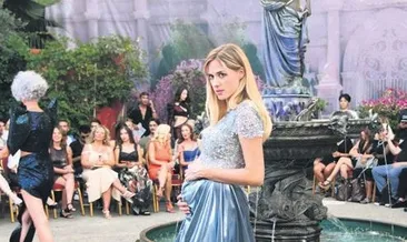 Karnı burnunda podyuma çıktı