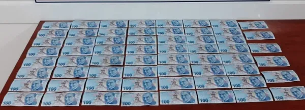 62-sahte-100-tllik-banknot-ile-yakalandilar-1660307136305.jpg