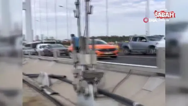 Son dakika haberi... İstanbul 15 Temmuz Şehitler Köprüsü'nde dehşet anları! Taksiyi durduran şahıs köprüden atladı | Video