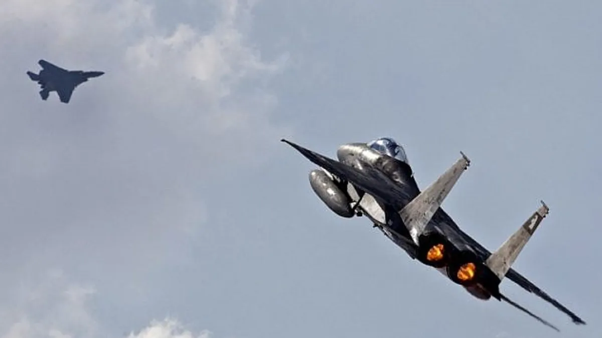 Japonya’ya ait F-15 savaş uçağı, sol kanadının üzerine yattı