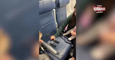 Uçakta bebeğini koltuğa bantladı! Binlerce yorum geldi: Bu yasal mı? | Video