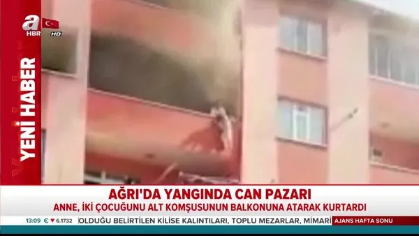 Çocuklarını yanan evden, alt kattaki komşu balkona atarak kurtardı