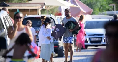 Burçin Terzioğlu ile sevgilisi Umut Duygu halk plajında 30 liraya serinledi! Sevgilisiyle böyle görüntülendi!