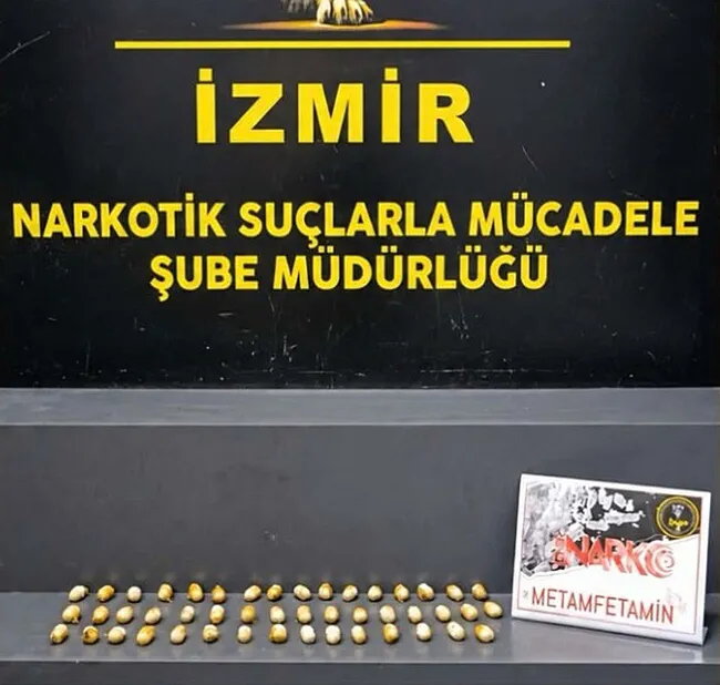 izmir-havalimaninda-uyusturucu-operasyonu-midesinden-cikanlar-soke-etti-iste-o-goruntuler-1793204006657.jpg