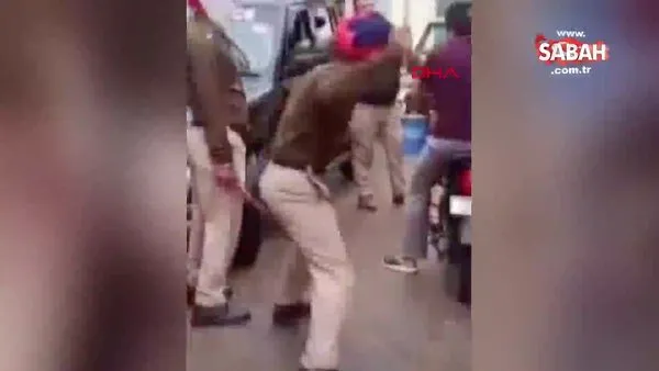 Hindistan'da polisten sokağa çıkanlara sopalı feci corona virüsü dayağı kamerada | Video