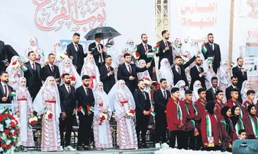 Savaşın gölgesinde toplu düğün