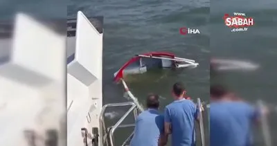 İzmir Körfezi’nde teknesi alabora olan amatör denizci böyle kurtarıldı | Video