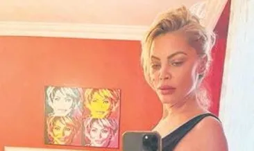 İkizlerini kucağına aldı