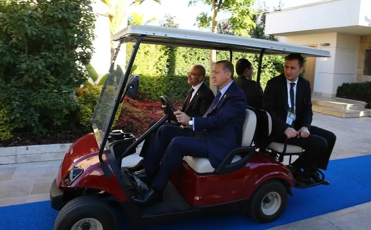 Golf arabasının direksiyonunda Erdoğan var