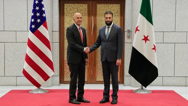 suriye-devlet-baskani-ahmed-es-sara-abdnin-suriye-ozel-temsilcisi-barrack-ile-gorustu-1756149336499.jpg