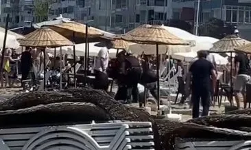 Bursa'da halk plajında şezlong kavgası! Tekme ve yumruklarla birbirlerine girdiler #bursa