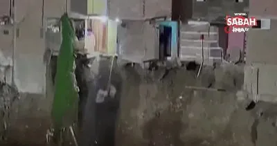 Heyelanda yıkılan evden polisin üzerine derin dondurucu düştü | Video