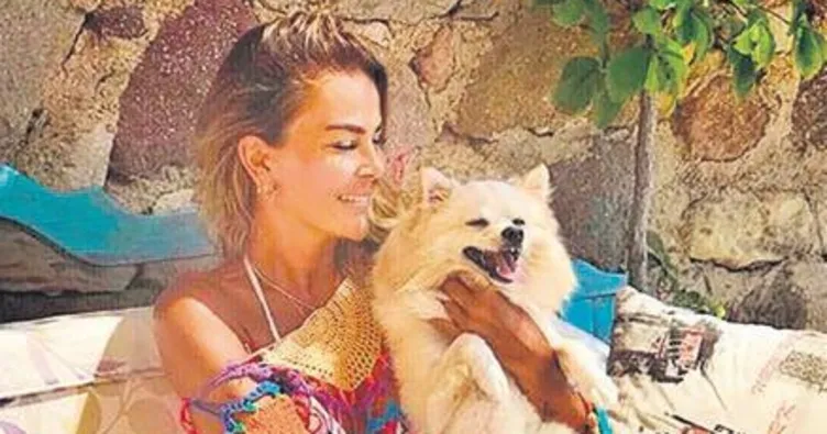 Köpeğinden ayrılmıyor