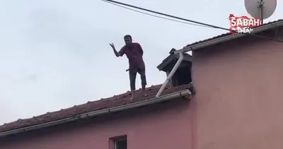 Ailesini göremediği için baltayla çatıya çıkan adam aşağı düştü