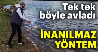 Kendi yöntemini geliştirdi, balıkları tek tek böyle avlıyor!