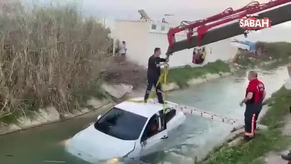 Tarsus'ta sulama kanalına düşen otomobili itfaiye ekipleri kurtardı | Video