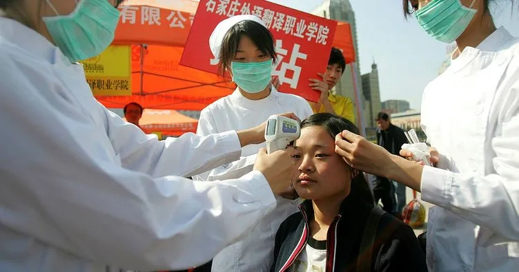 Çin’de gizemli hastalığa yol açan virüsün insandan insana bulaştığı tespit edildi