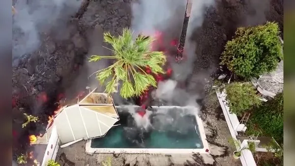 La Palma Adası'ndaki yanardağ dehşetinin yeni görüntüleri ortaya çıktı! Lavların evleri yuttuğu anlar kamerada..