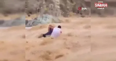 Umman’da sele kapılan 2 çocuğu boğulmaktan fotoğrafçı kurtardı | Video