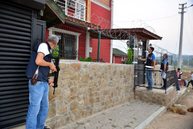 Pitbull ile korunan lüks villaya tefeci baskını