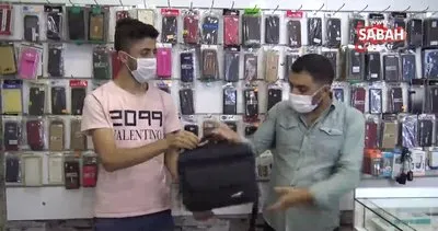 Suriyeli genç kaldırımda bulduğu telefon dolu çantayı sahibine teslim etti | Video