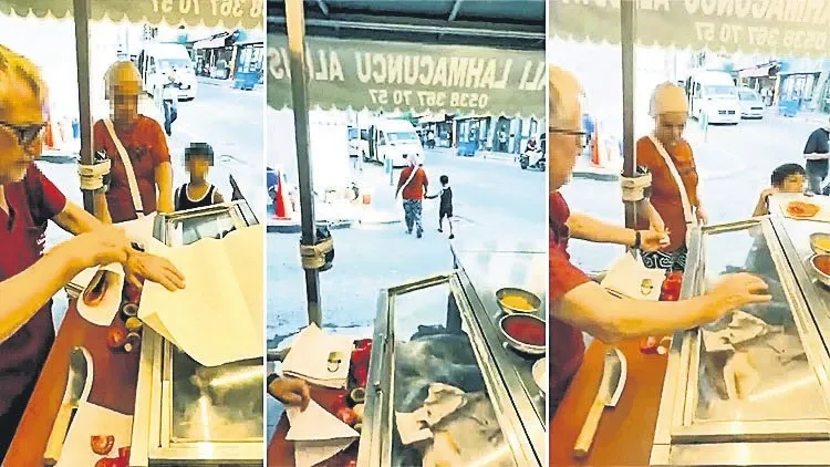 Oğluna lahmacun alan anneyi azarlayan esnaf Oğluna lahmacun alan anneyi azarlayan esnaf
