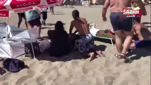 Plajda komşularına bıçakla saldırdı! 3 kişiyi yaraladı | Video