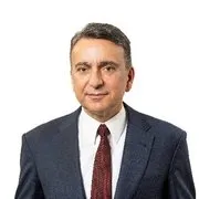 AZMİ KARAMAHMUTOĞLU