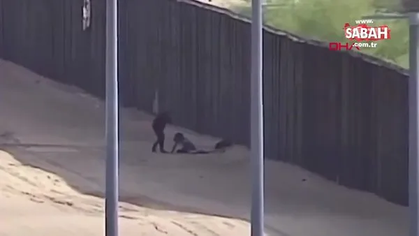 ABD'ye kaçak geçişte bir çocuğun 5 metrelik duvardan düşüşü güvenlik kamerasında