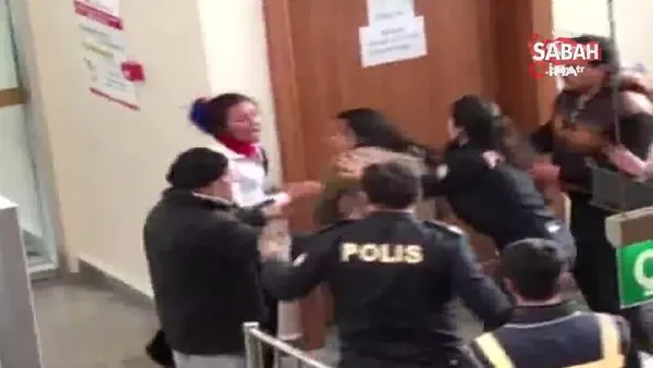 Ankara'da adliyede çıkan kavgada bebeğini polislerin üstüne atmaya çalışan kadına tepki!