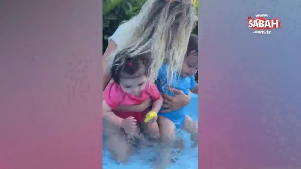 Seray Sever, ikiz kızlarıyla havuz keyfi yaptı | Video