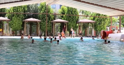 Vatandaşlar Karaköprü Belediyesi havuzlarında serinliyor