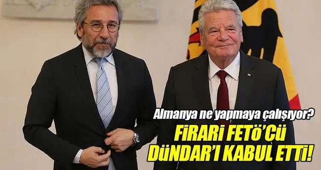 Gauck hakkında yakalama kararı olan firari FETÖ’cü Dündar’ı kabul etti!