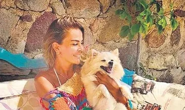 Köpeğinden ayrılmıyor