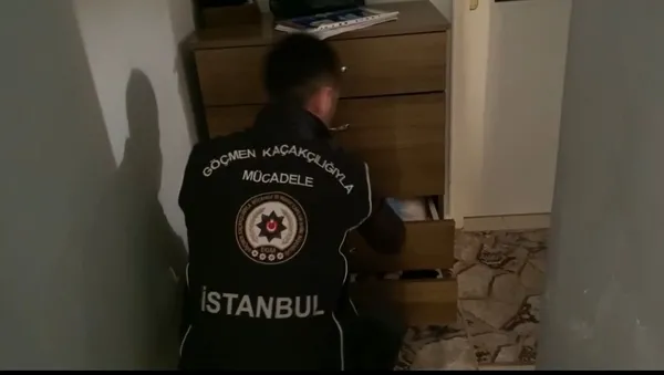 istanbulda-es-zamanli-gocmen-kacakciligi-ve-sahte-belge-operasyonu-18-gozalti-1780640489873.jpg