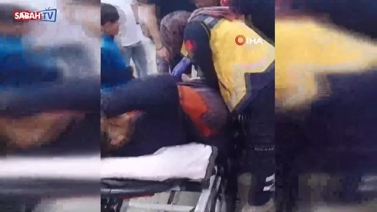 Silahlı kavganın ortasında kalan yaşlı kadın ayaklarından yaralandı | Video