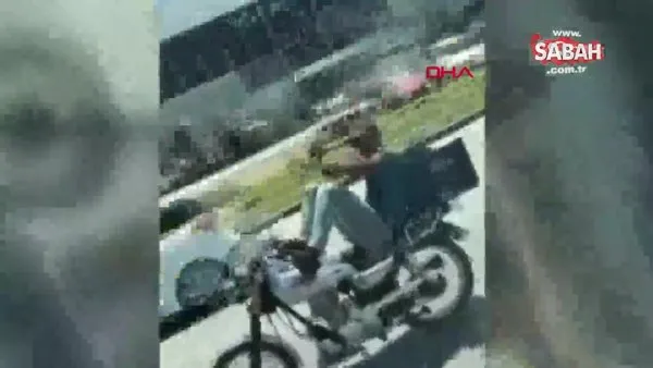 Gidonu ayaklarıyla kontrol eden motosikletliye para cezası | Video